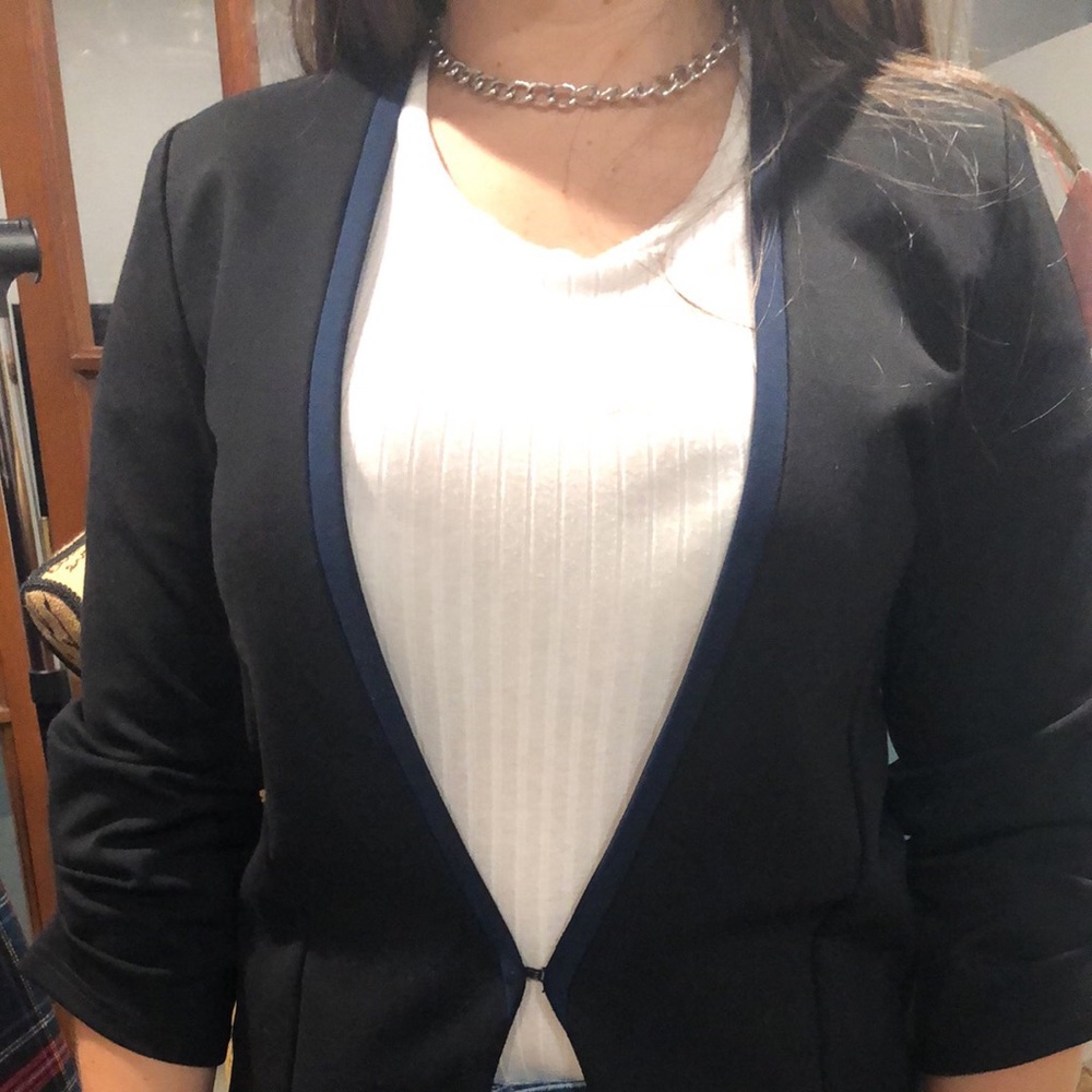 Elaine turned- small black and blue blazer. Fun design. 3/4 sleeves.